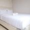 Homey 2BR Apartment at The Edge Bandung By Travelio