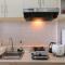 Homey 2BR Apartment at The Edge Bandung By Travelio