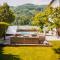 Bungalow Donaublick mit Pool und Garten