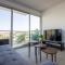 Beachside 1-bed with huge veranda