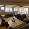 Riverfront Penthouse Studio with Spacious Terrace