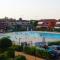HOTEL APARTMENTS VILLAGGIO DEI FIORI EXTRA LUXURY 4 STARS - Great Family Resort - Petz Friendly - with Hypermarket - Delivery Restaurant-Pizzeria - Room Breakfast with supplement - Ultra Fast WI-FI - Parking adjacent to the Room - with Mechanical Workshop