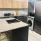 11 Elizabeth Place - Beautiful and spacious self catering 2 bedroom unit next to Kyalami Racetrack with free WiFi swimming pool gym and restaurant Perfect for a small family in Midrand Waterfall - Midrand