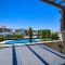 Junior Villa Zeus, hot tub and communal pool, Aphrodite Hills