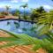 F2 Ixora - spa - piscine - vue mer - 9 min de la plage - Ti Zwézo Paradi - 拉特里尼泰