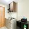 Modern Look and Tidy Studio Gateway Park LRT City Jatibening Apartment By Travelio