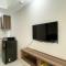 Modern Look and Tidy Studio Gateway Park LRT City Jatibening Apartment By Travelio