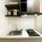 Modern Look and Tidy Studio Gateway Park LRT City Jatibening Apartment By Travelio