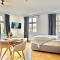 Modernes Appartement "ALTE MÄDCHENSCHULE", inkl Stellplatz, E-Bike Ladestation, Boxspringbett, Business, 2 Personen, gratis Kaffee und Tee, WLAN