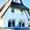 Villa Haffblick - Ferienhaus mit Kamin, Sauna und Meerblick