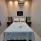 Quarto Suíte 5, Pousada Marabá á 4 minutos do Aeroporto