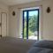 Chambre et terrasse dans une ancienne bergerie - Olargues