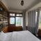 The ISISINGA - A Forest Retreat In Mountains