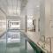 Lovely 1BR Apartment On Morphett with Pool & Wi-Fi