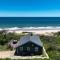 Stunning Waterfront Views Beach steps away