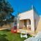 Villa Mina con Jacuzzi nel Boomerang Village a Torre Colimena