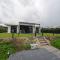 Villa with covered terrace and jetty on the water - Zeewolde