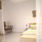 White openair apartment by Aelios in Ialysos - Ialyssos