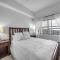 Uhost AI - Top-Floor Condo w Balcony & Pool