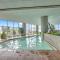 Uhost AI - Top-Floor Condo w Balcony & Pool