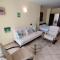 SUN AND FLOWERS APARTMENT and STUDIO in front of the sea - توبولا