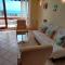 SUN AND FLOWERS APARTMENT and STUDIO in front of the sea - توبولا