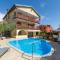 Family-friendly apartments with swimming pool Novigrad - 11242