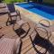Recanto com piscina Aquecida e uma bela vista - 伊比乌纳