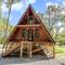 Modern A-Frame Cabin by Rip Van Winkle with Hot Tub