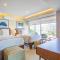 Upscale Corner Unit with Large Wrap Around Balcony and Pools - Puerto Vallarta