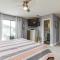 Cozy Beach Bungalow with a Heated Pool - شاطئ بينساكولا