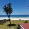 Beachfront Surfside 2BR Apartment - The Coachhouse