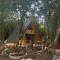 Woodland paradise Charming wooden houses in stone