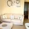 Apartamentos Carlton VyB