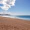 Beachfront Sunset View Apartment - The Coachhouse