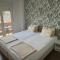 T lux apartman