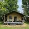 Glamping tent in oase van groen