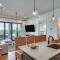 Luxe Beachfront WindMark Cottage with Deck!