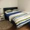 Chambre spacieuse et confortable avec écran plat - Oetwil an der Limmat