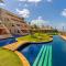 Oceanview A102 - PÉ NA ÁREA - perto do centro, 2 dormitórios, piscina, cozinha, 116m2