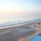 Tropical 1BD vacation condo in beautiful resort setting with pool amenities to enjoy - شاطئ أورموند