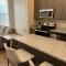 Strongback Suite 205 - Adrian