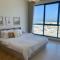 Elegant 3 BR APT footsteps from a mall & a beach