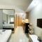Minimalist Studio Room Gateway Park LRT City Bekasi Apartment By Travelio