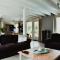 Wooden house Maison Les Terrasses, a blend of authenticity and refinement - Dévillac