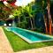 Tropicália Chalés Boutique