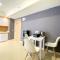 Tranquil Designed 2BR at Meikarta Apartment By Travelio