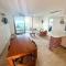 Escape to Serenity by the Sea! Beachfront Apartment with Pool, Just 5 Minutes from the Ferry - Cancún