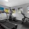Super Lux 4BR Townhouse - 1 Mile from Disney World- Resort Pool & Jacuzzi , Gym, with Enchanted Garden - أورلاندو