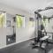 Super Lux 4BR Townhouse - 1 Mile from Disney World- Resort Pool & Jacuzzi , Gym, with Enchanted Garden - أورلاندو